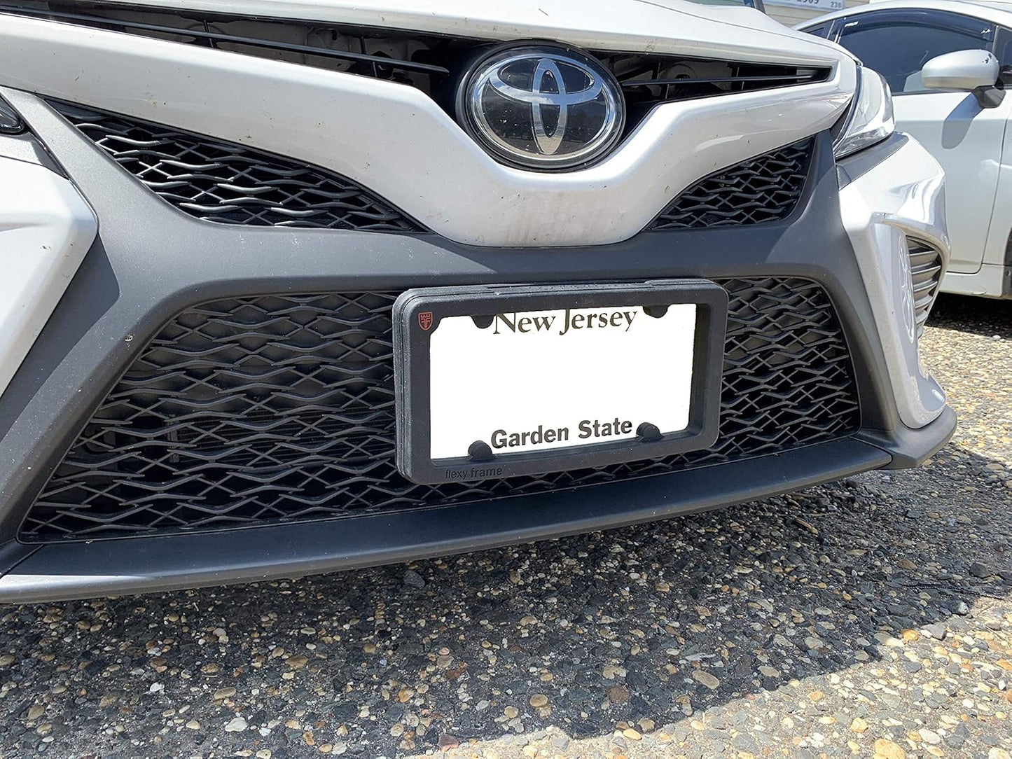 A NASA-Like Rubber Heavy Duty Front License Plate Frame Tag Holder Guard Bumper for Toyota